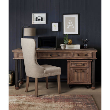 Michael Amini crossings office desk